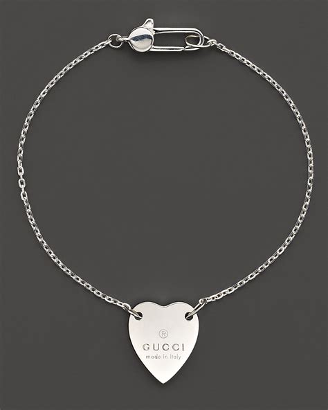 gucci sterling silver engraved heart bracelet|heart bracelet with gucci trademark.